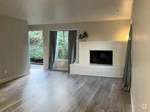 Building Photo - NEWLY REFRESHED Two Bedroom Townhome Style...