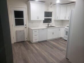 Building Photo - Beautifully Renovated Home with Updated Kitchen and bath, paint, and flooring! FREE SOLAR TOO!!!!
