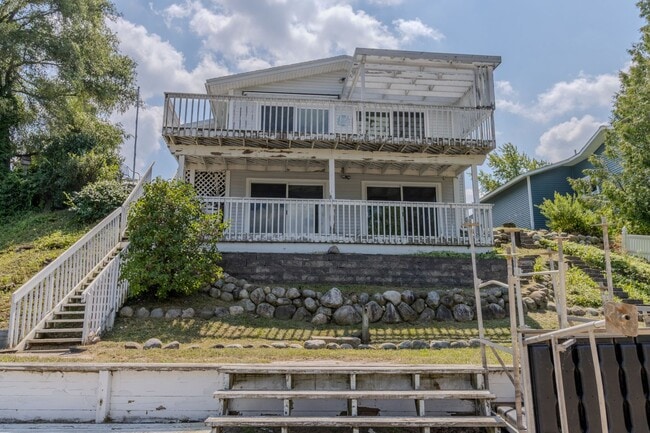 Building Photo - Price Improvement! Lakefront Dream Home – ...