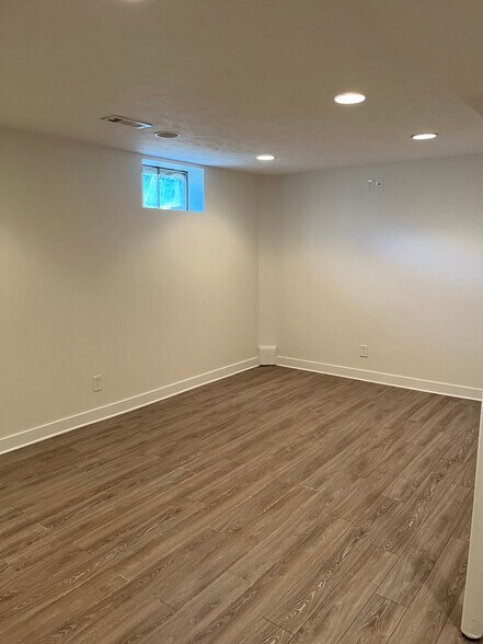 put in new vynl plank tile in the basement - 12063 Burdette Cir