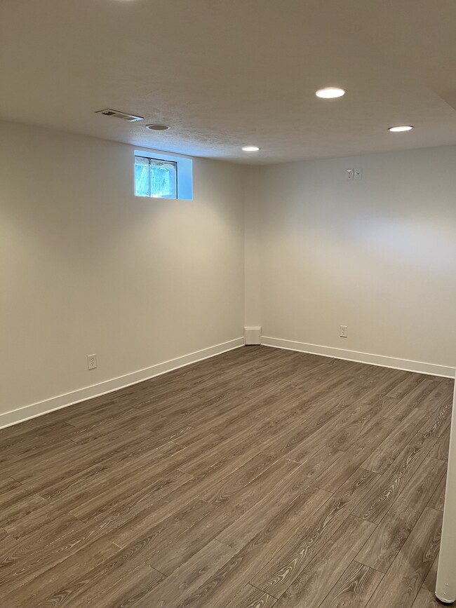 put in new vynl plank tile in the basement - 12063 Burdette Cir
