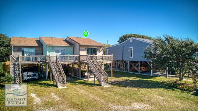 Building Photo - Beach Please @ 218 Sandpiper Dr