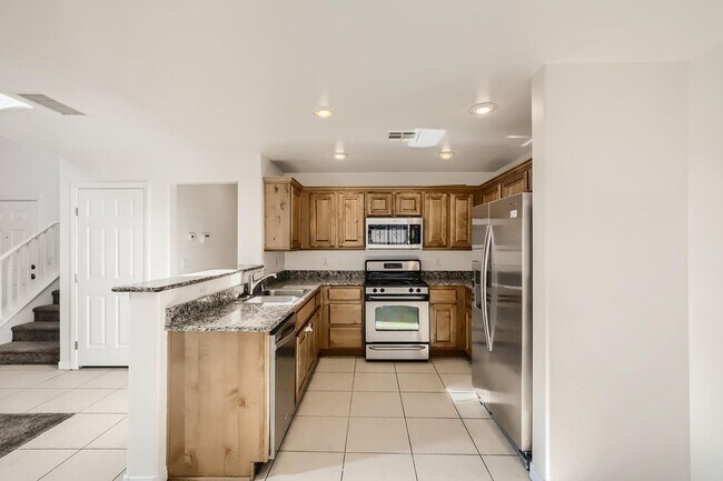 Building Photo - 2 Story with Vaulted Ceiling and All Kitchen Appliances