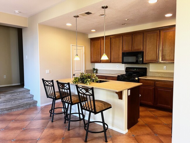 Kitchen with seating area - 801 Almond Rd