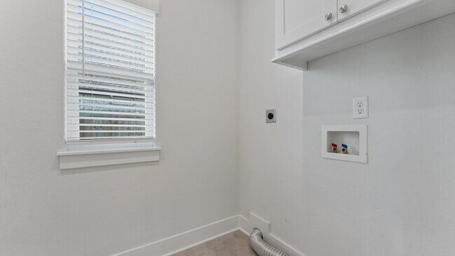 Building Photo - "Lovely 4-Bedroom Retreat with Fireplace &...