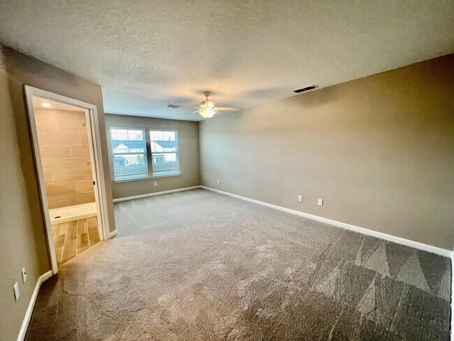 Building Photo - Lagoon Life + Luxury Living in St. Johns County - Beachwalk Townhome on the water!