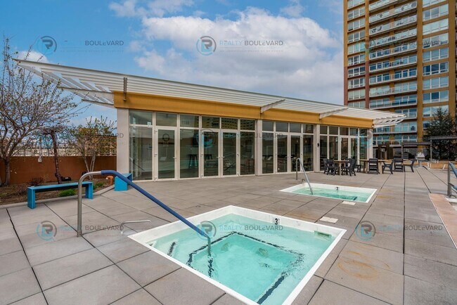 Building Photo - Modern 1 Bedroom 1 Bath Luxury Condo at Th...