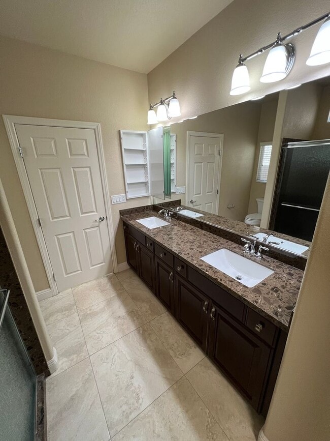 Building Photo - A Fantastic 4 Bedroom Home with the primary Downstairs, in Silverado Ranch