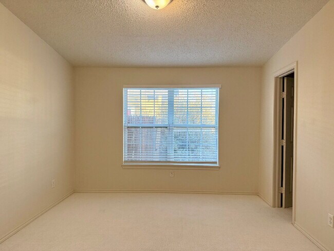 Building Photo - Modern Elegance Meets Location: High Ceilings, Updated Fixtures, Move-In Ready!