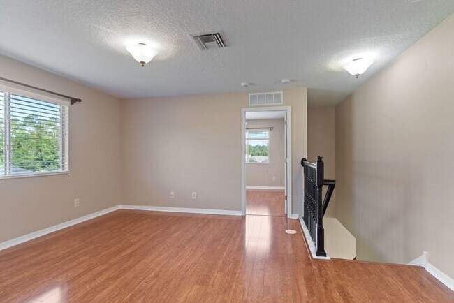 Building Photo - Executive Living Waits!