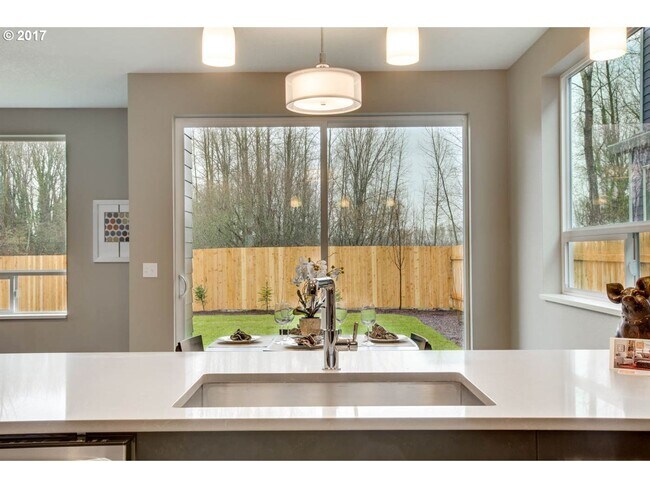 Building Photo - Charming 3BR Home with Fireplace, Bright Open Living Spaces & Loft