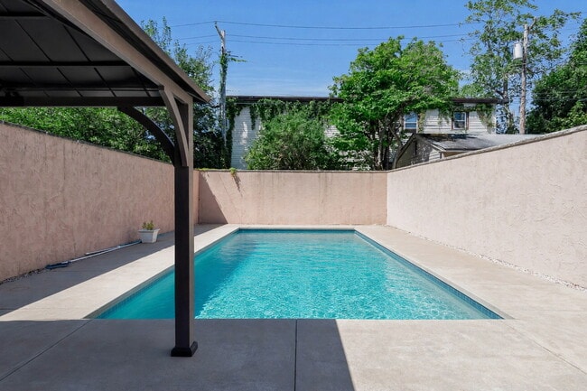 Building Photo - Furnished 4-Bedroom Home with a Private Pool near Elmwood Village