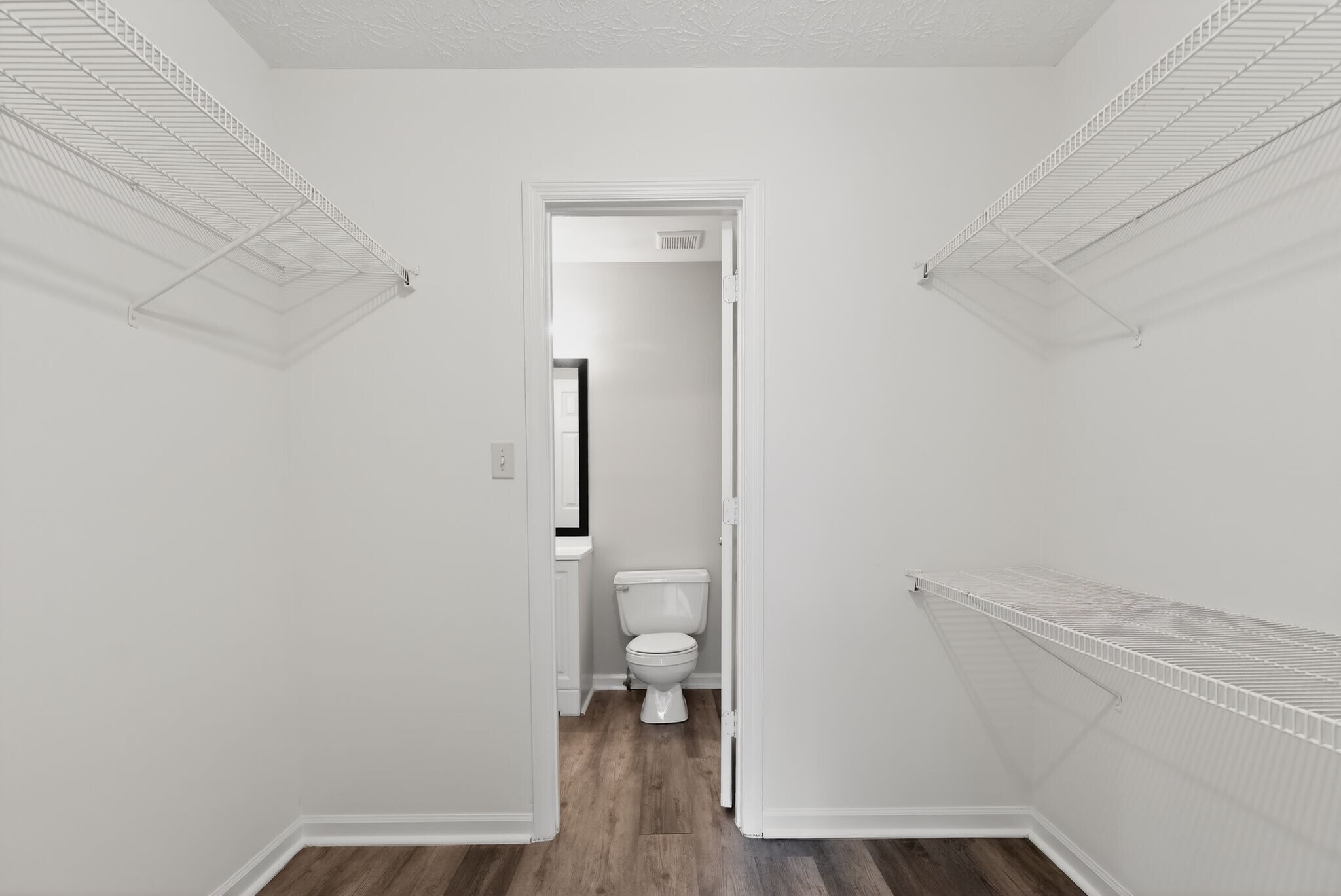 Large walk-in closet between the bedroom and bathroom - 1029 Plantation Way NW