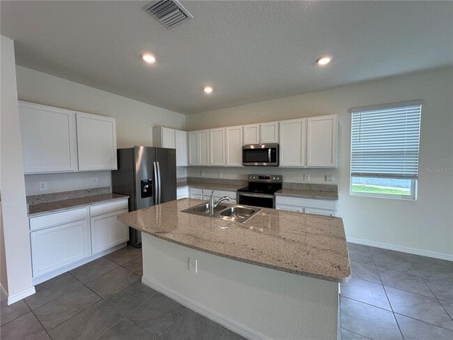 Building Photo - 8813 Milestone Dr