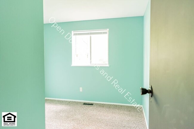 Building Photo - 6718 Raintree Rd