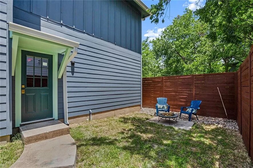 Backyard, complete with a firepit and lawn chairs, perfect for relaxing and enjoying the ATX weather - 5402 Duval St