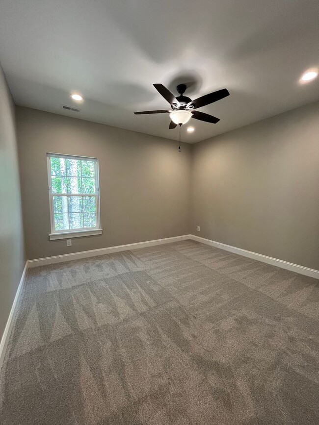 Building Photo - Three bedroom, 2.5 bath new construction a...