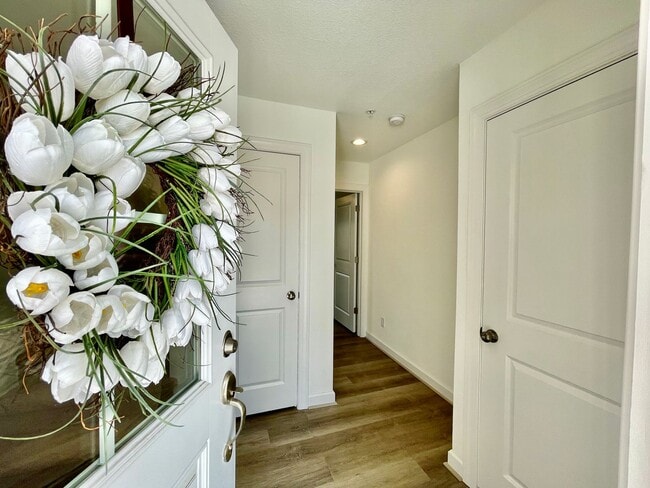 Building Photo - Practically New & Available NOW! Americana Luxury Townhomes! Pet Friendly! Attached Garage! All A...