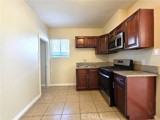 Building Photo - 6951 Garden Dr