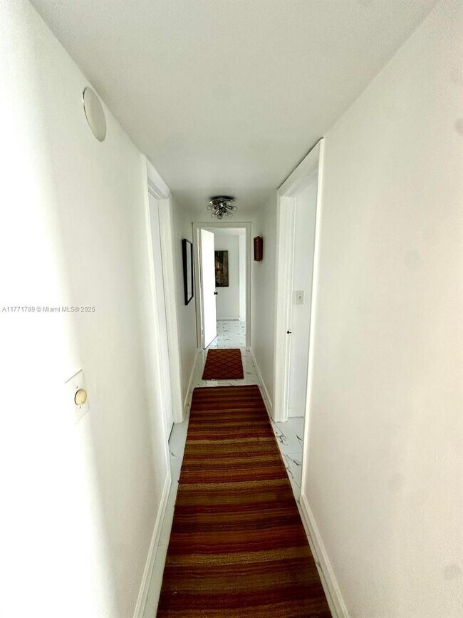 Building Photo - 6423 Collins Ave
