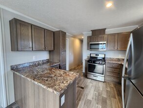Building Photo - 9072 Windward Dr