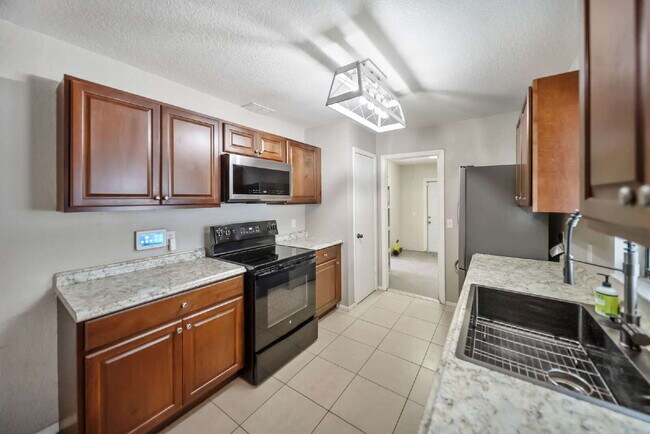 Building Photo - Heated Pool. Premium Upgrades. Fully Renov...