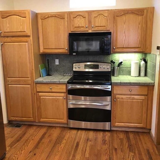 Building Photo - Luxury four bed four bath patio home avail...