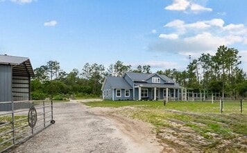 Building Photo - Gated 10-Acre Luxury Retreat with 40x60 Climate-Controlled Shop & Barn!