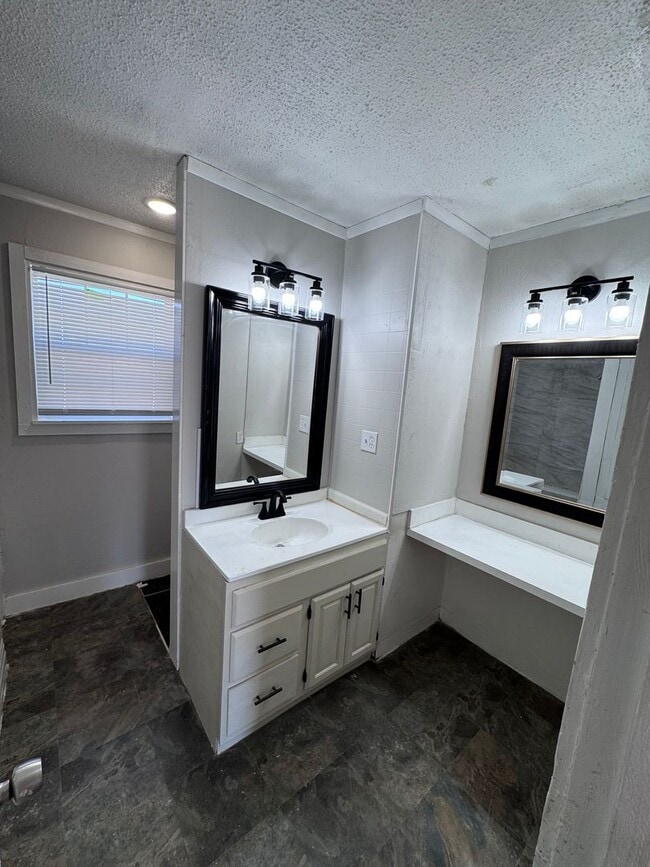 Building Photo - Just Renovated-Right off I-27 and 50th Street