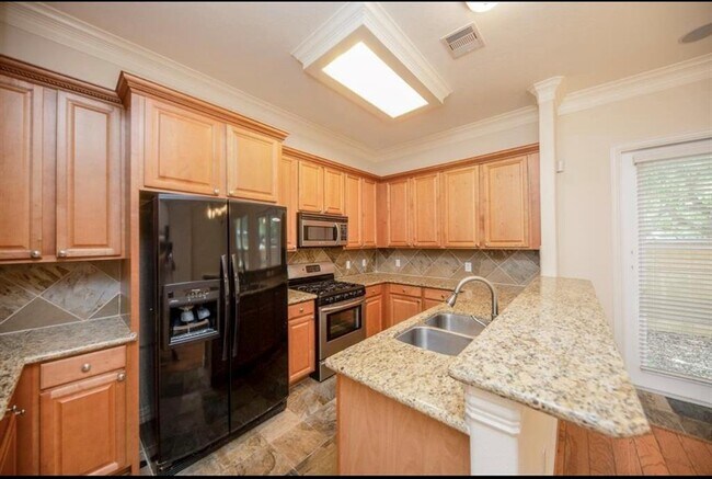 Building Photo - 7103 Windwater Lagoon Dr