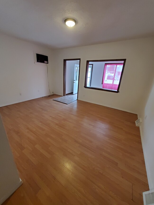 Living room & enclosed porch - 110 Orchard St