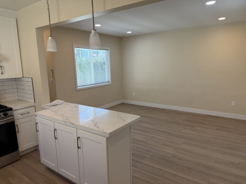 Kitchen peninsula and living room - 619 Linwood Ave
