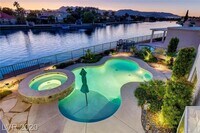 Building Photo - Vegas's Only Available Waterfront Rental ~ 4 Bedroom Desert Shores Lake Front Home