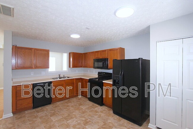 Building Photo - 3208 Mango Dr