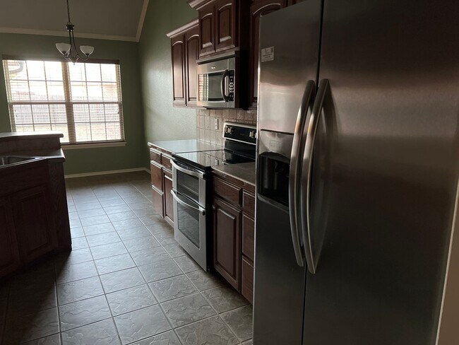 Building Photo - functionality, style, and comfort—3 Bedroom 2 Bath with 3 car garage