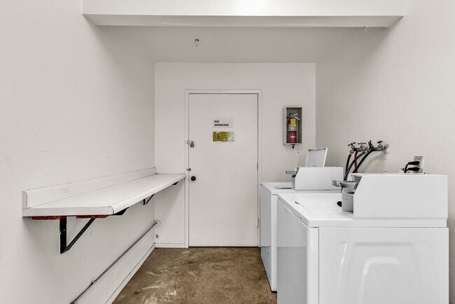 Building Photo - This is a large 2-bdr in a convenient, Freshly painted, updated kitchen counter tops and cabinets