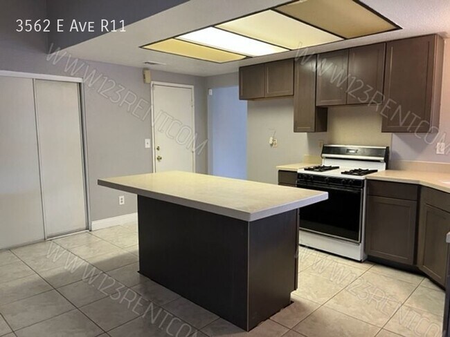 Building Photo - 3562 E Ave R-11