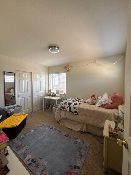 Large bedroom across hallway bath - 8022 Mammoth Dr