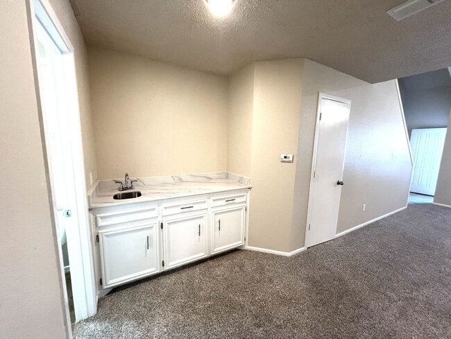 Building Photo - **BEAUTIFUL WHISPERWOOD COMMUNITY CONDO**