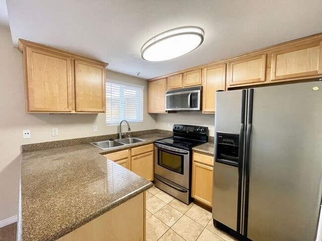 Building Photo - Beautiful 2BD/2BA Condo With Two Parking Spaces in PB