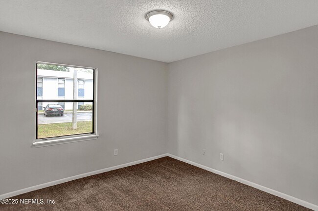 Building Photo - 10825 Key Haven Blvd