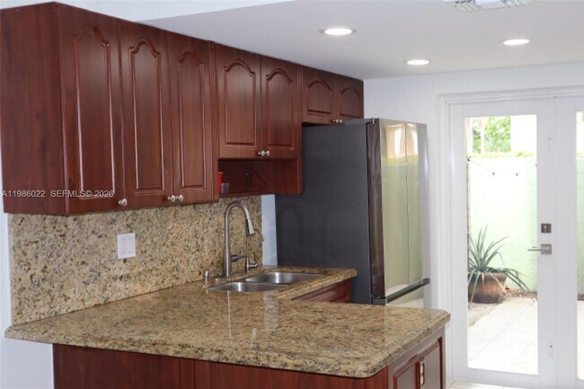 Building Photo - 10101 W Okeechobee Rd