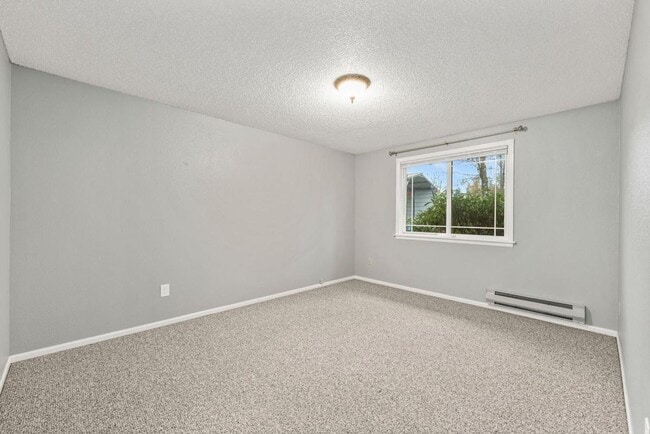 Building Photo - Charming Tacoma Home with A/C, RV Parking, Workshop & Skylit Living Room