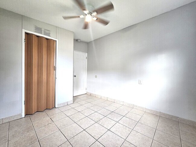 Building Photo - Stunning 4 Bed 1 Bath Block Home on Fenced Lot with Fruit Trees