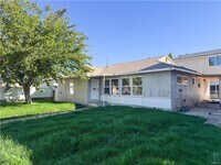 Building Photo - Welcome to this inviting 3 bedroom, 2 bath residence tucked away on a peaceful street in the hear...