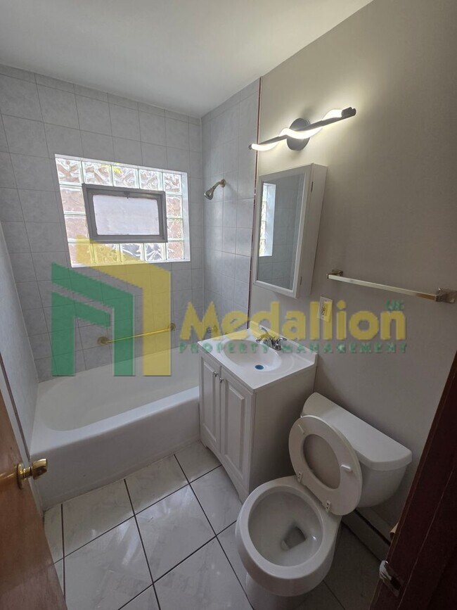 Building Photo - Spacious 6-Bedroom Home with Finished Basement and Backyard