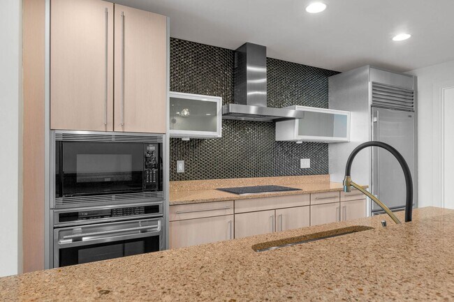 Building Photo - “Sleek Design Meets Walkable Downtown Livi...