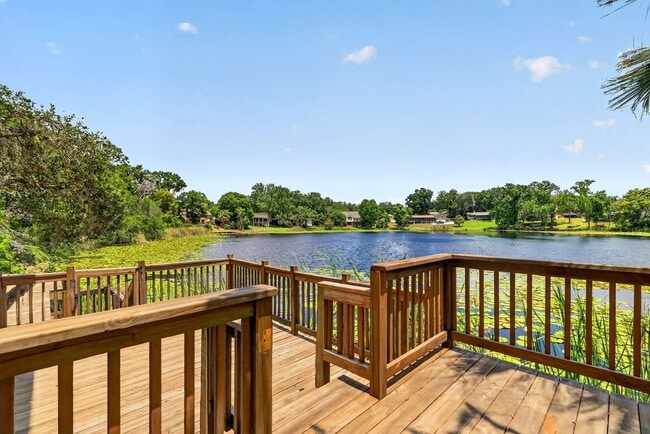 Building Photo - Available Now! Waterfront Living at Its Best – Pool, Decks & Gated Privacy