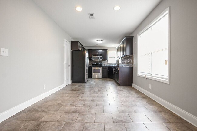 Building Photo - Pet Friendly Four Bedroom with Basement!