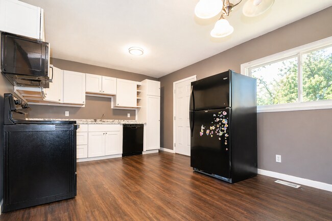 Building Photo - This charming 5-bedroom, 2-bathroom home is available for $2,000/month.
